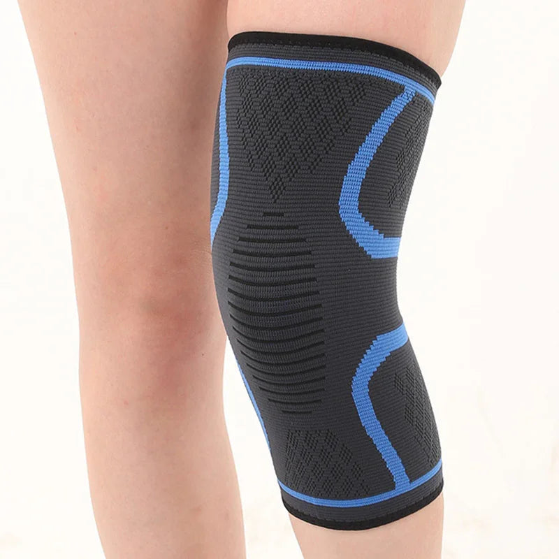Black and blue knee support sleeve worn on a leg, compression brace for joint pain relief