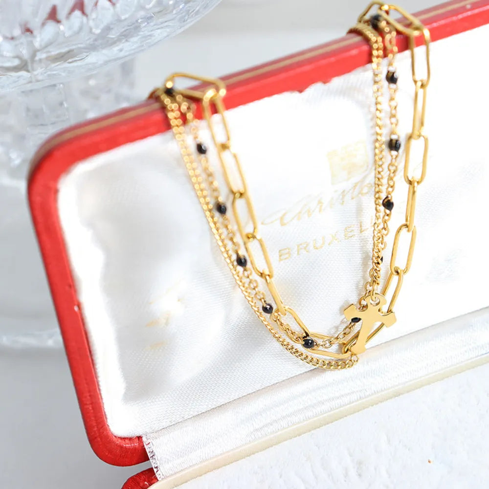 Minimalist Titanium Steel Three-Layered Chain and Bead Bracelet for Women.