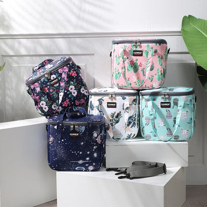 Collection of floral and patterned coolers on a white surface with a neutral background