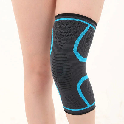 Elastic black and blue knee support brace worn on leg for compression and joint support