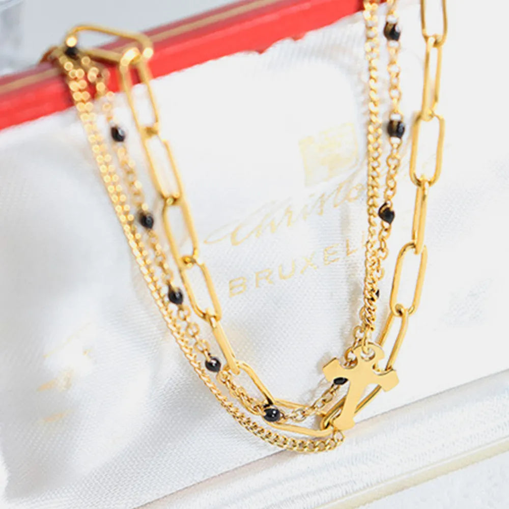 Minimalist Titanium Steel Three-Layered Chain and Bead Bracelet for Women.