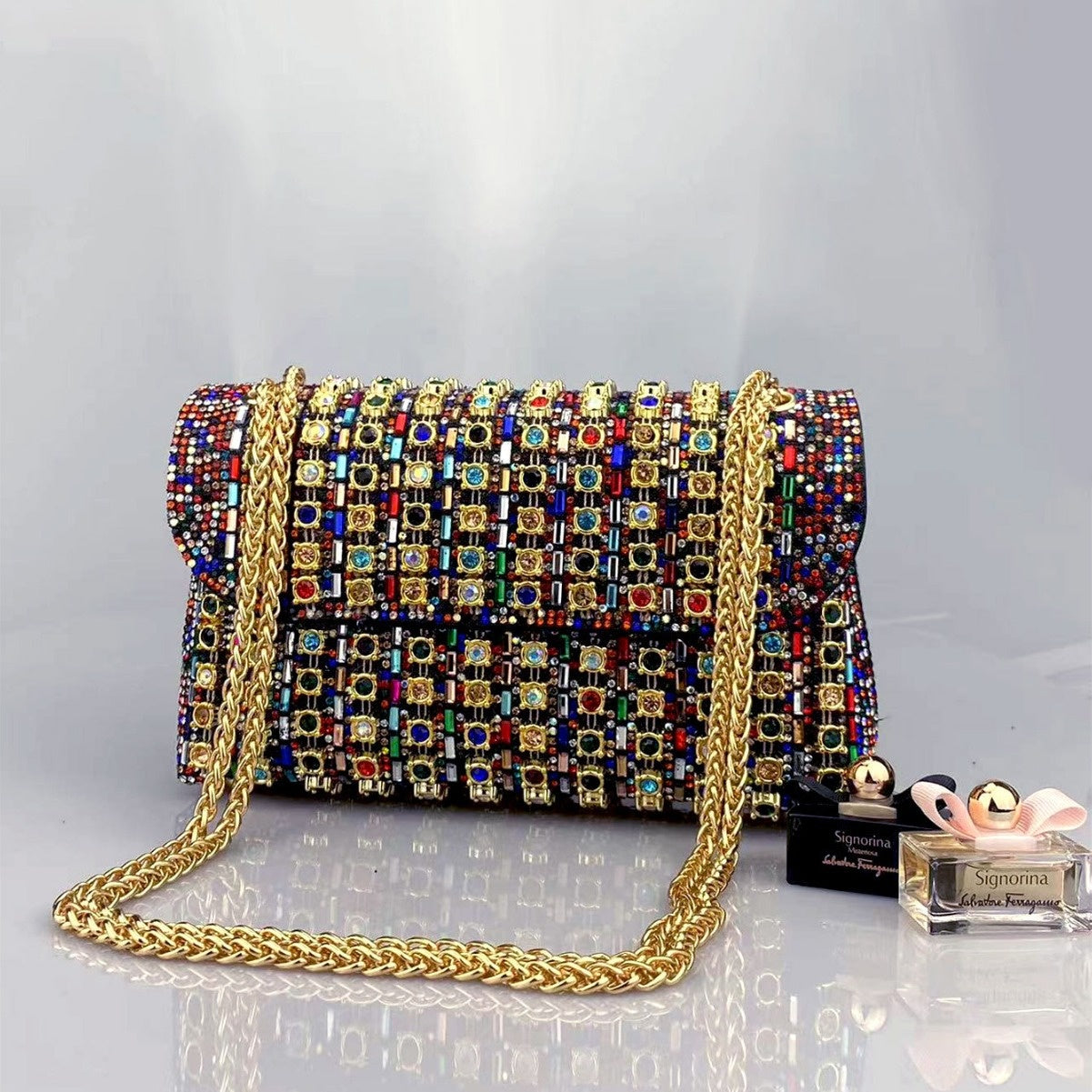 Elegant Black and Gold Chain-Adorned Evening Clutch Bag with Long Strap