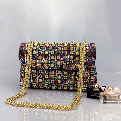 Elegant Black and Gold Chain-Adorned Evening Clutch Bag with Long Strap