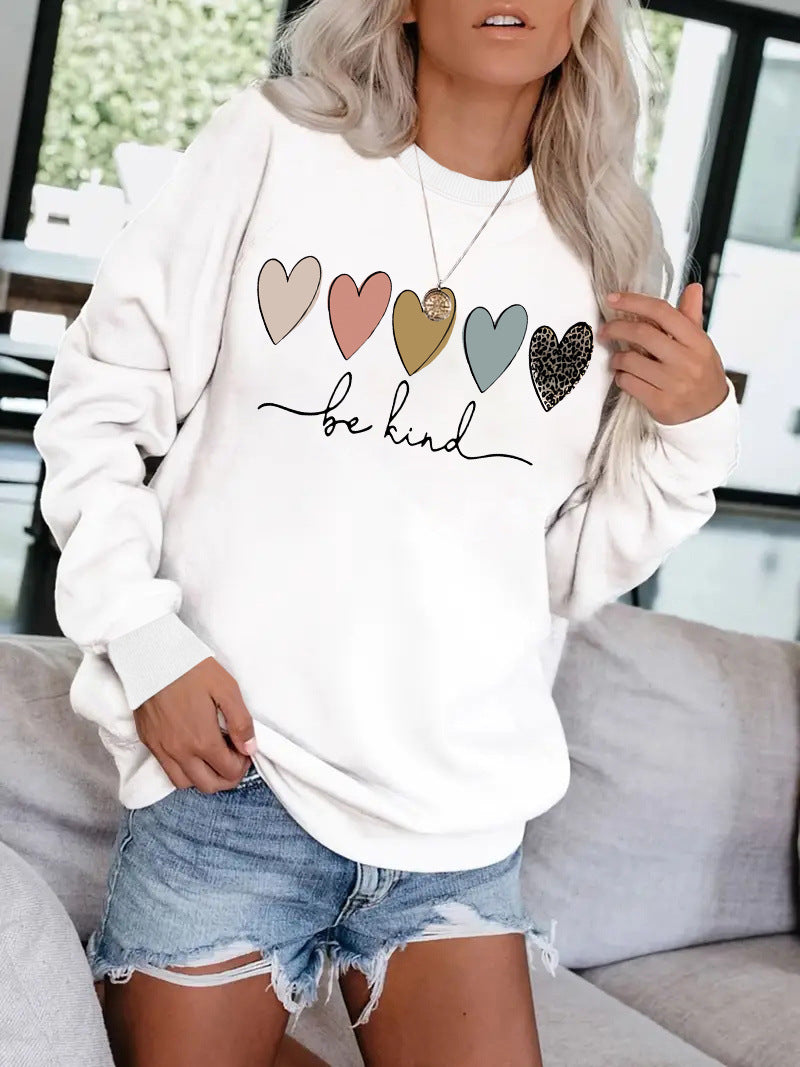 Be Kind" Multicolor Heart Print Black Sweatshirt | Cozy Women's Love Graphic Pullover