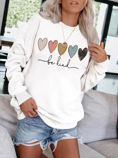 Be Kind" Multicolor Heart Print Black Sweatshirt | Cozy Women's Love Graphic Pullover