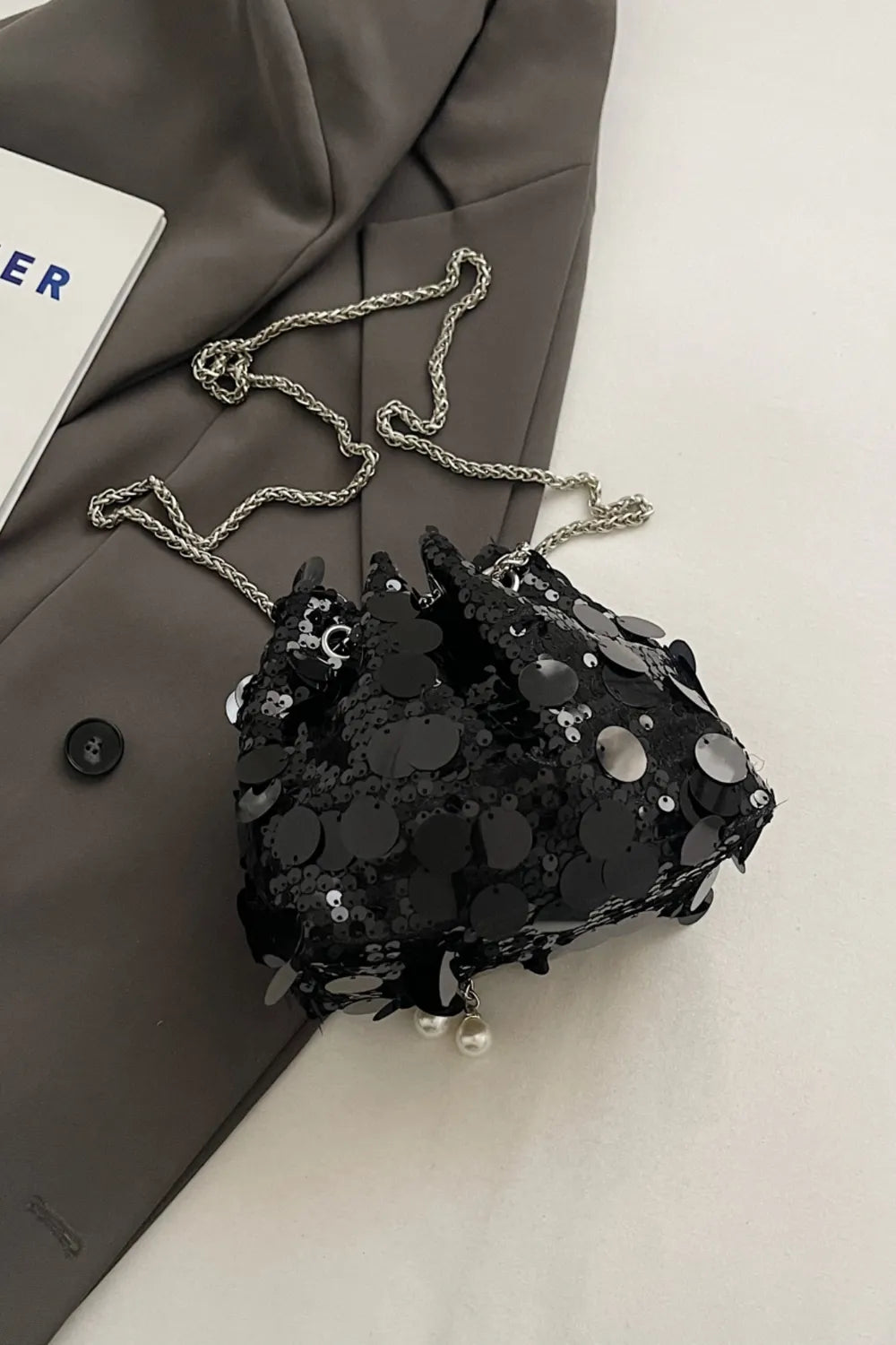 Shimmering Drawstring Sequin Pouch Crossbody Bag