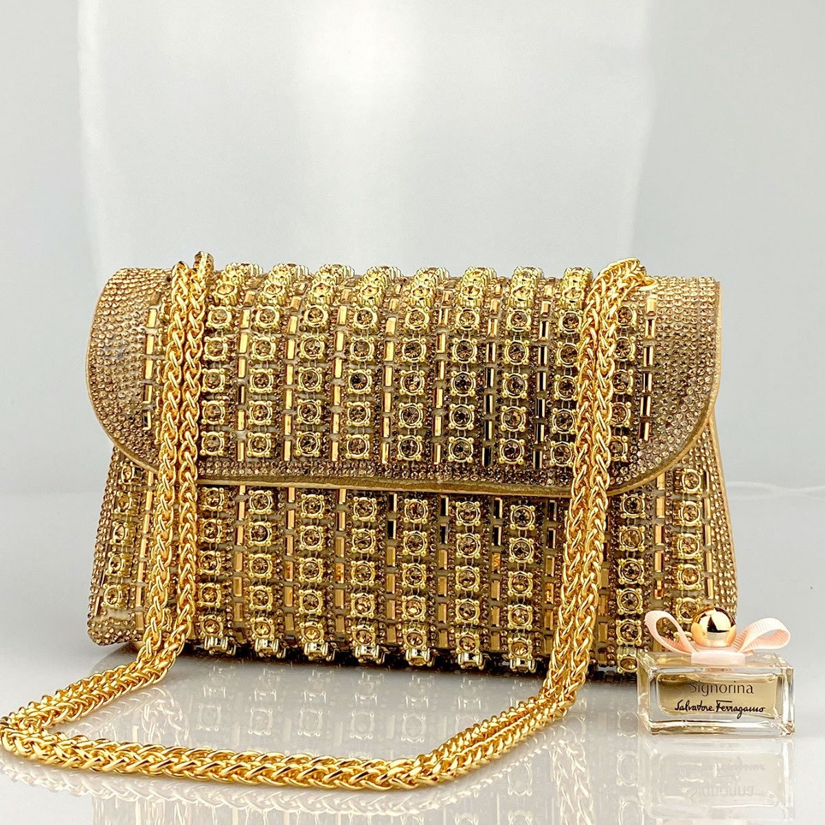 Elegant Black and Gold Chain-Adorned Evening Clutch Bag with Long Strap