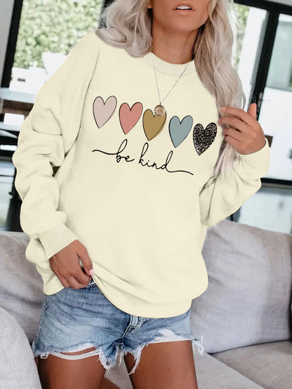 Be Kind" Multicolor Heart Print Black Sweatshirt | Cozy Women's Love Graphic Pullover