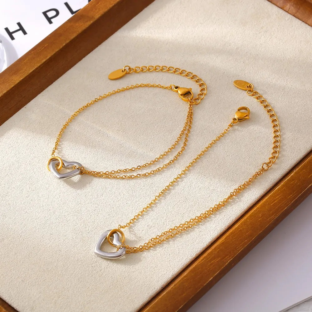 Elegant 18K Gold-Plated Two-Tone Heart Charm Bracelet for Women