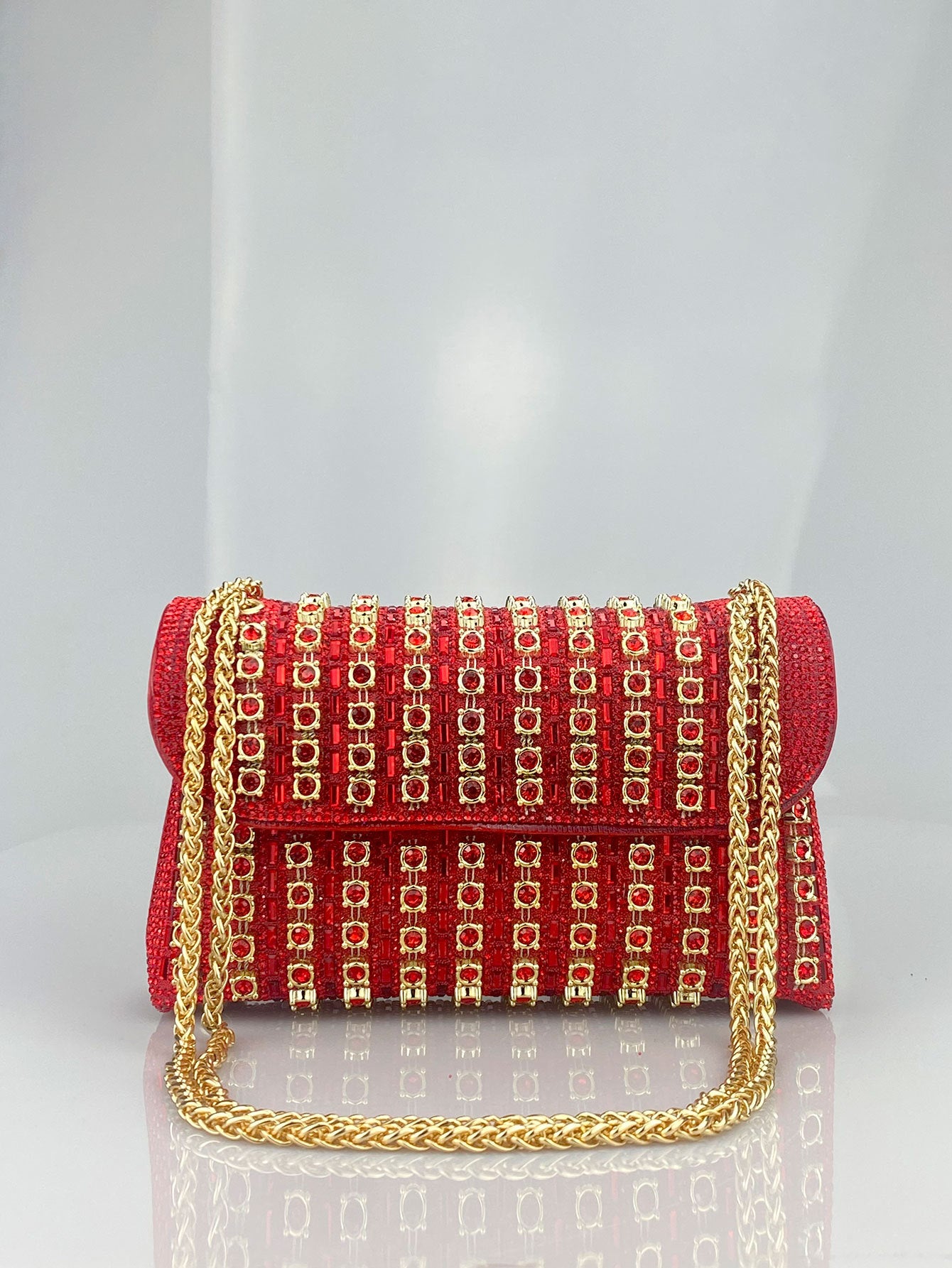 Elegant Black and Gold Chain-Adorned Evening Clutch Bag with Long Strap