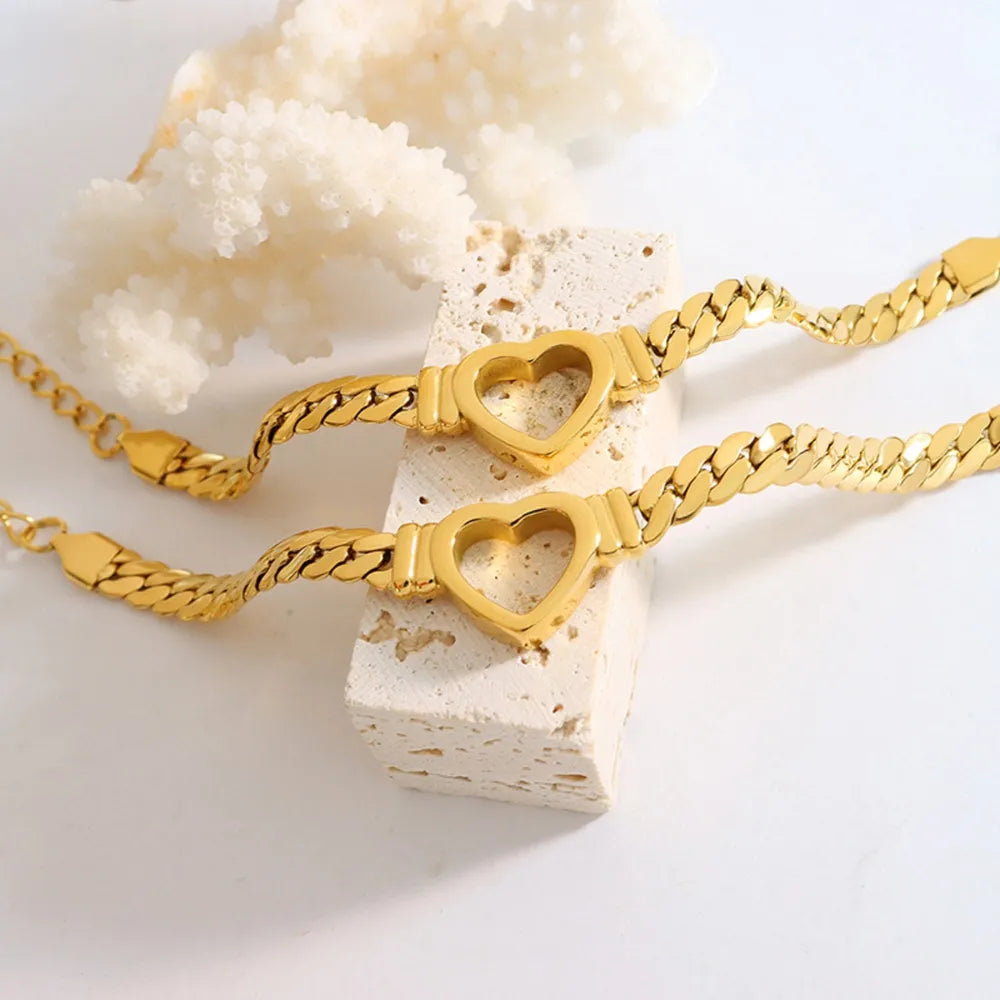Trendy Gold Titanium Steel Cutout Heart Curb Chain Bracelet.