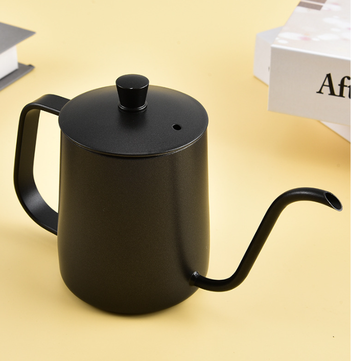 Black gooseneck kettle on a beige background