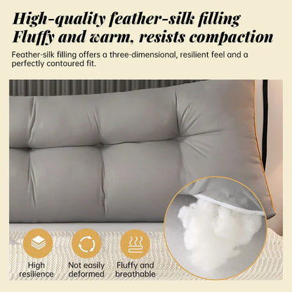 Gray tufted pillow with feather-silk filling, highlighting fluffy, breathable, high-resilience material.