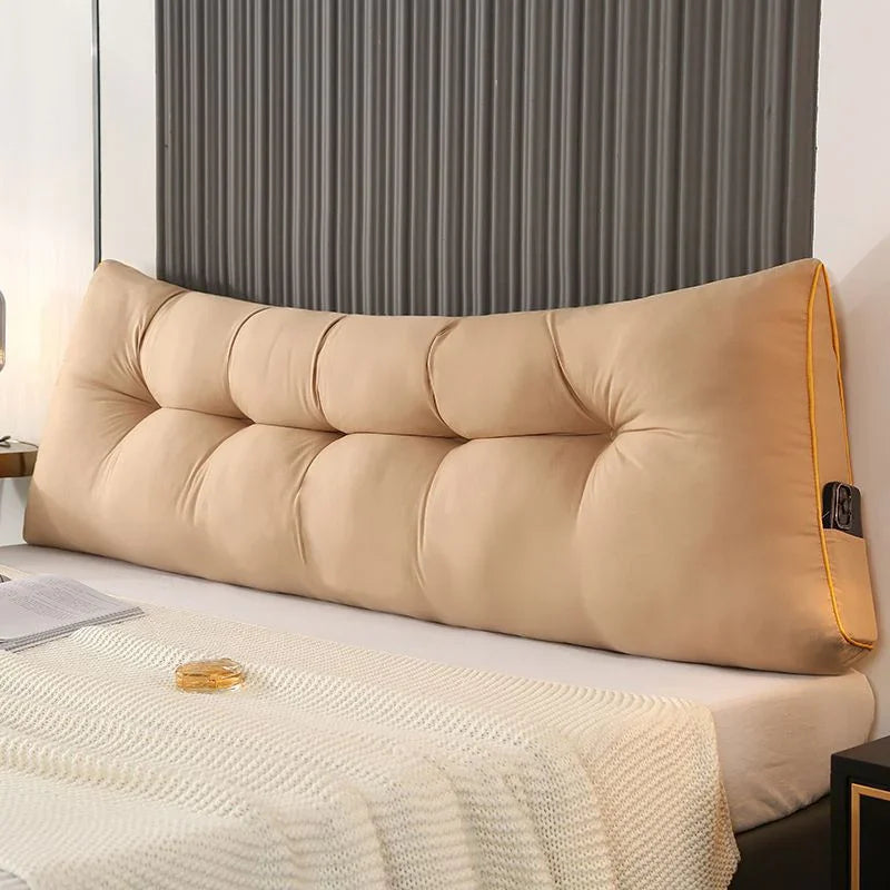 Beige tufted backrest pillow on a bed, modern bedroom decor, cozy bedroom accessory