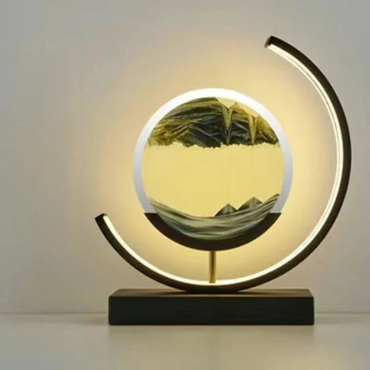 Modern LED table lamp with circular frame and illuminated sand art decor