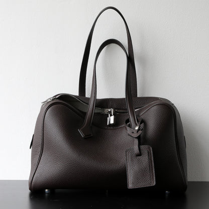 Elegant Textured Leather Handbag and Crossbody Bag