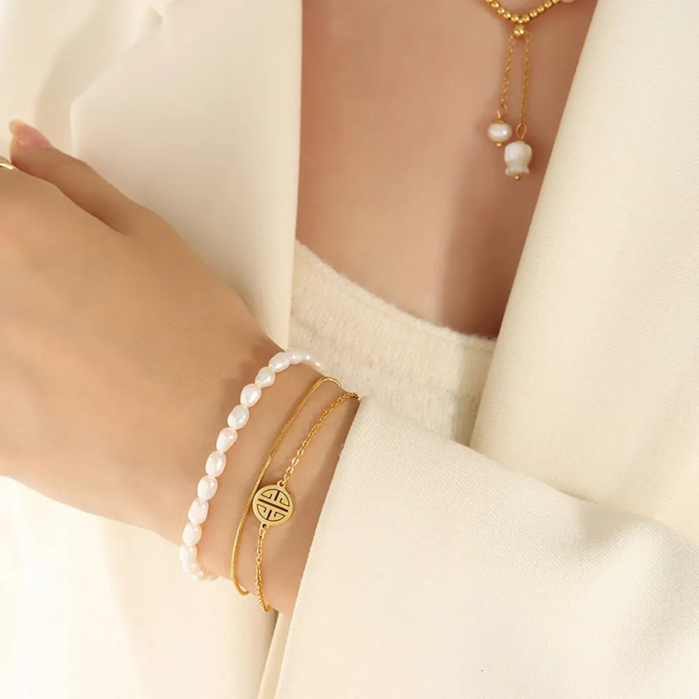 Titanium Steel Three-Layered Pearl Bracelet with Lucky Coin Charm
