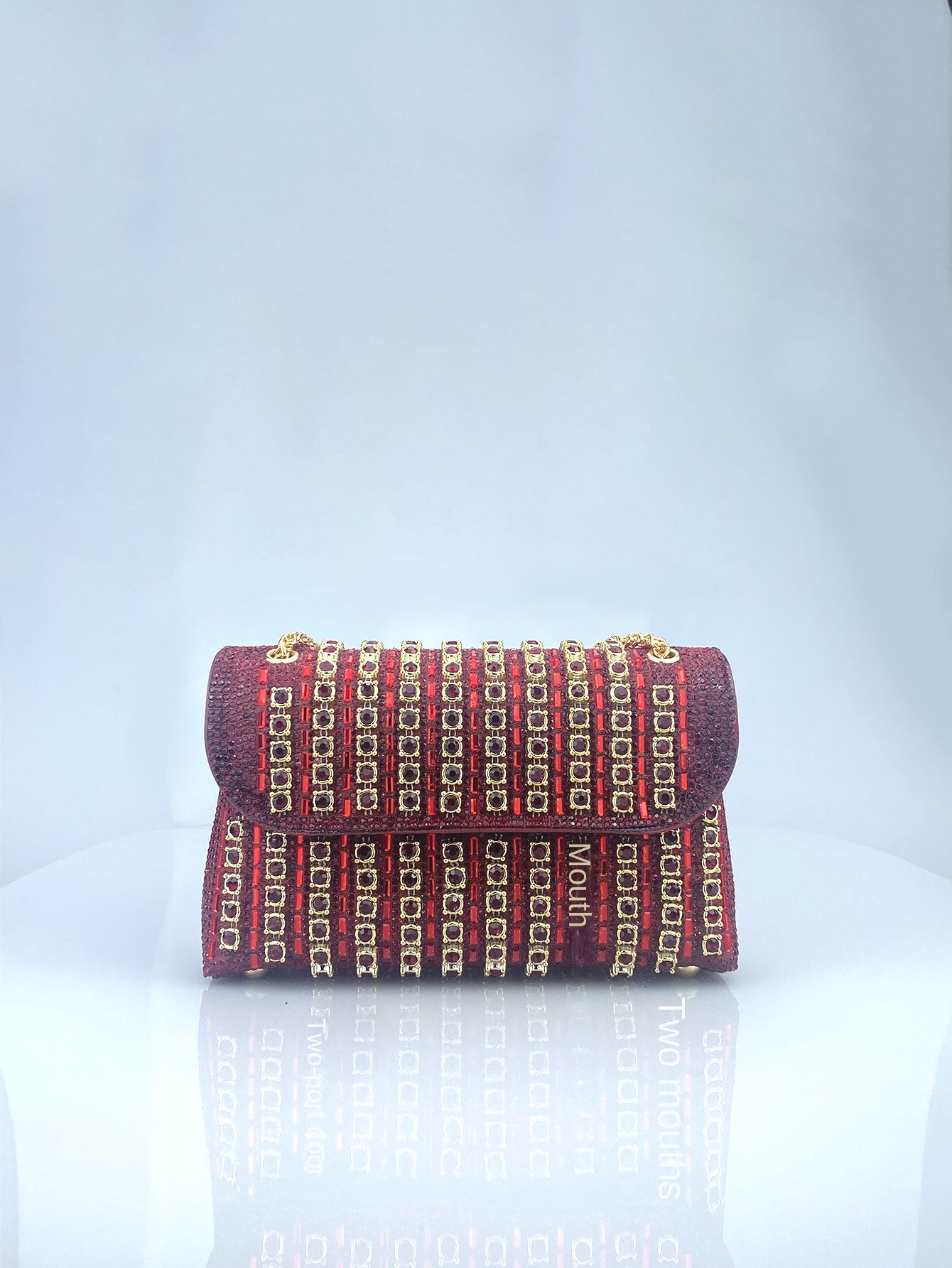 Elegant Black and Gold Chain-Adorned Evening Clutch Bag with Long Strap