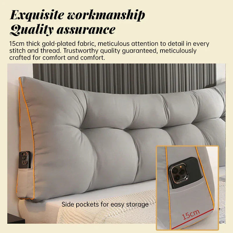 Gray upholstered headboard pillow with side pocket for phone storage, gold trim, tufted design.