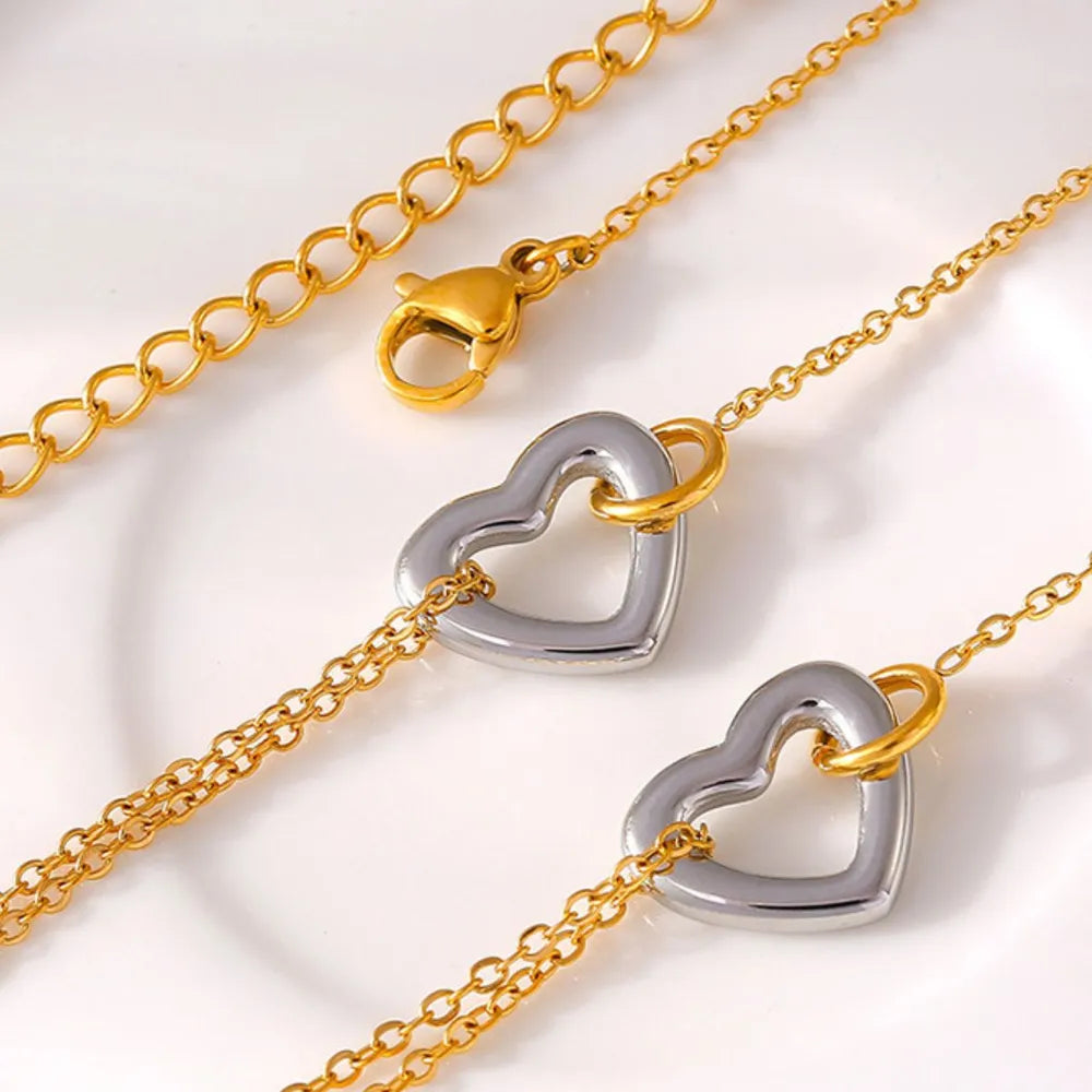 Elegant 18K Gold-Plated Two-Tone Heart Charm Bracelet for Women