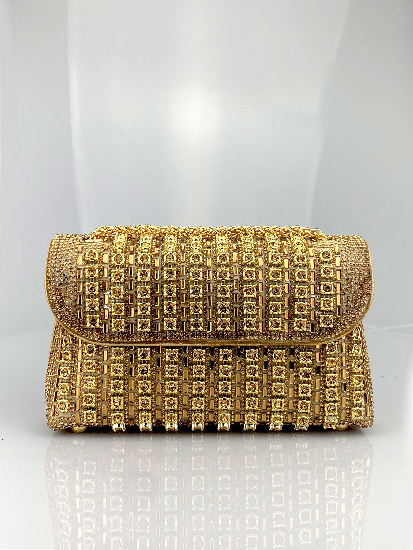 Elegant Black and Gold Chain-Adorned Evening Clutch Bag with Long Strap