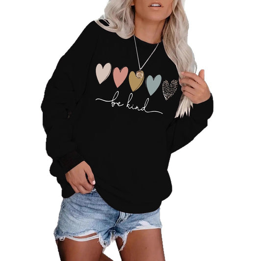 Be Kind" Multicolor Heart Print Black Sweatshirt | Cozy Women's Love Graphic Pullover