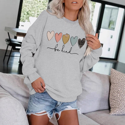 Be Kind" Multicolor Heart Print Black Sweatshirt | Cozy Women's Love Graphic Pullover
