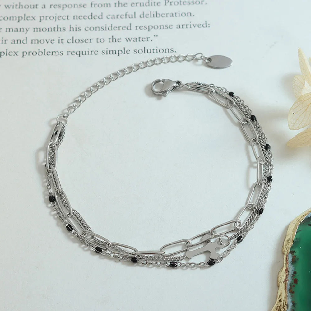 Minimalist Titanium Steel Three-Layered Chain and Bead Bracelet for Women.