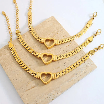Trendy Gold Titanium Steel Cutout Heart Curb Chain Bracelet.