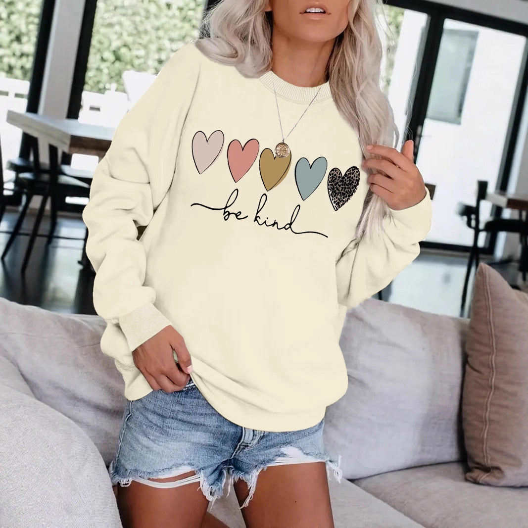 Be Kind" Multicolor Heart Print Black Sweatshirt | Cozy Women's Love Graphic Pullover